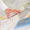 Male Architect's Hands Holding Pencil And Ruler Stock Photo