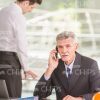 Aged Man Engineer Talking The Mobile Phone Stock Photo