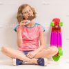 Cute Young Skater Eating Chocolate Stock Photo