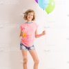 Happy Girl In Roller Skates With Balloons And Cup Of Juice Stock Photo