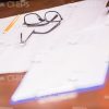 Glasses And Business Papers On The Table Stock Photo