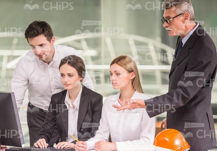 Engineers Discussing Project Stock Photo