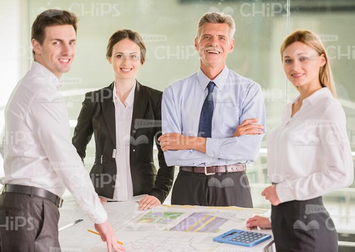 Happy Team Of Engineers Stock Photo