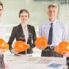 Architects With Construction Helmets Stock Photo