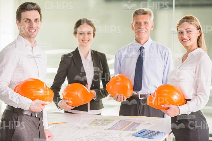 Architects With Construction Helmets Stock Photo