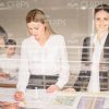 Nice Woman Working With Drawing Stock Photo