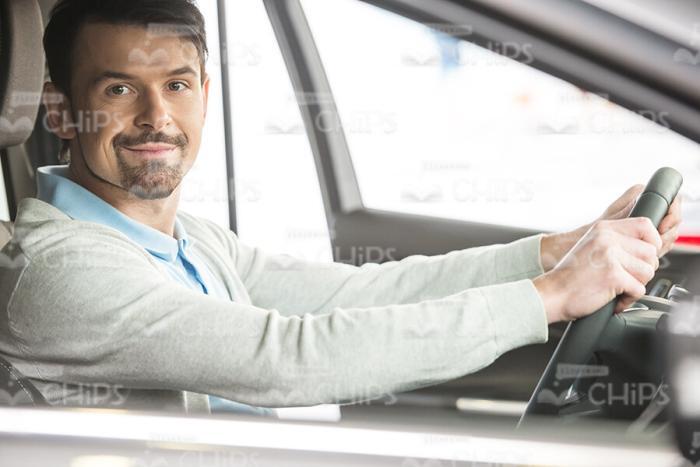 Man Trying The New Car Stock Photo