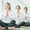 Young Business People Meditating Stock Photo