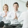 Office Workers Meditating Stock Photo