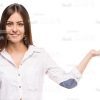 Smiling Woman Pointing With Left Hand Stock Photo Isolated On White