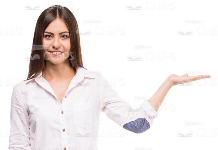 Smiling Woman Pointing With Left Hand Stock Photo Isolated On White