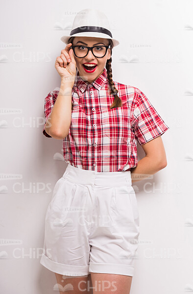 Surprised Young Girl Wearing Eyeglasses Stock Photo