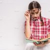 Young Woman Reading Book Stock Photo