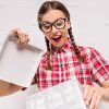 Excited Young Girl Opening The Box Stock Photo
