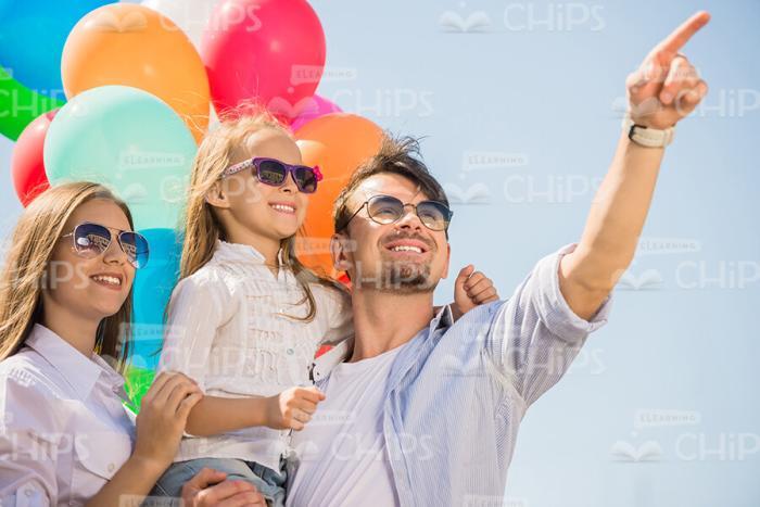 Happy Young Family Resting Outdoor Stock Photo
