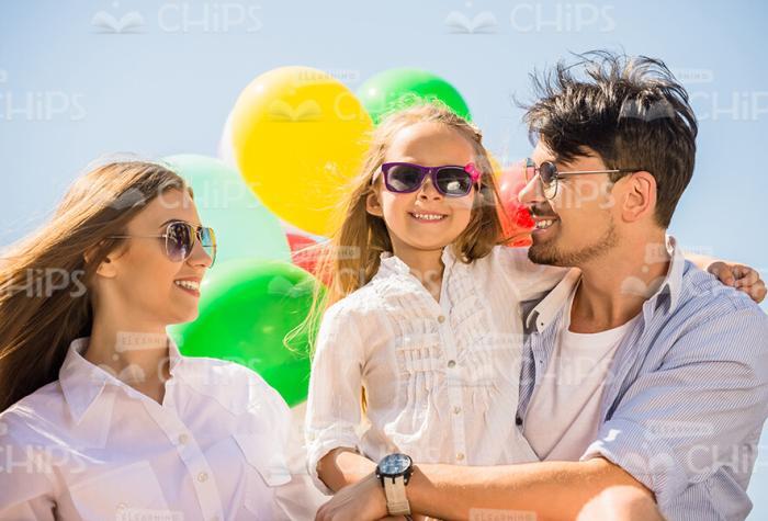 Young Family Walking Together Stock Photo