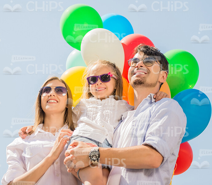 Happy Family Outdoors Stock Photo