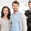 Excited Couple And Car Salesman Stock Photo