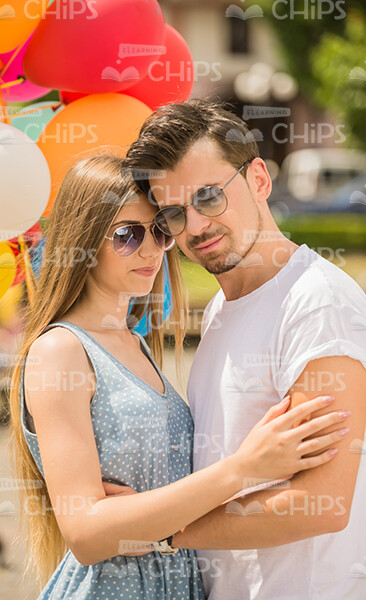 Handsome Young Couple Hugs Stock Photo