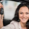 Happy Young Girl Showing Car Keys Stock Photo
