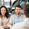 Insurance Broker Advises Couple Stock Photo