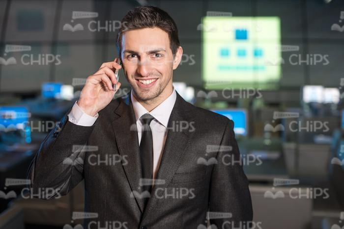 Businessman Using Headset Stock Photo