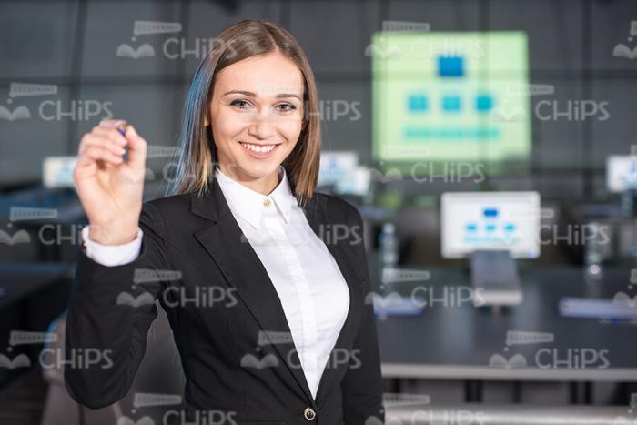 Business Lady Smiles And Looks Self-Confident Stock Photo