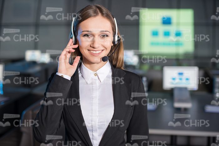 Business Adviser Using Headset Stock Photo