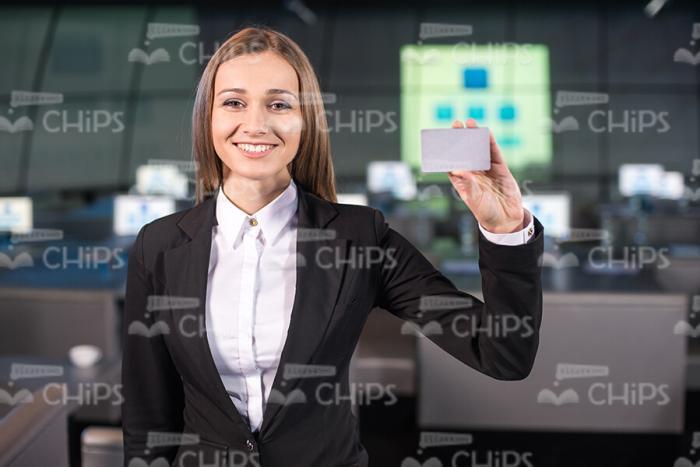 Businesswoman Holding Card Sample Stock Photo
