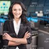 Smiling Business Lady Standing With Arms Crossed Stock Photo