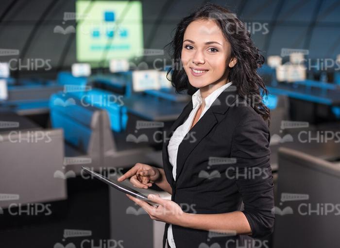 Nice Businesswoman Using Tablet Stock Photo