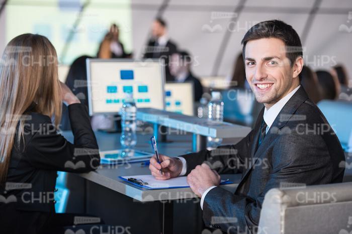 Smiling Young Man At Work Stock Photo