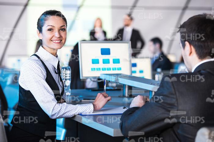 Smiling Woman At Business Conference Stock Photo