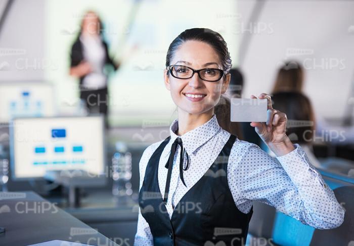 Young Woman With Business Card Stock Photo