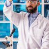 Lab Researcher Working With Liquids Stock Photo