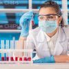 Lab Researcher Working With Liquids Stock Photo