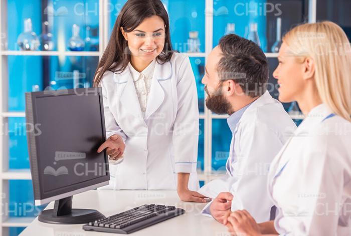 Researcher Presenting Information On Display Stock Photo