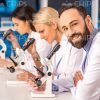 Bearded Male Researcher With Colleagues Stock Photo