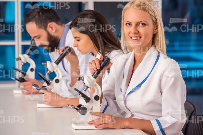 Blonde Young Scientist Conducting Research Stock Photo