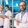 Positive Bearded Researcher Stock Photo