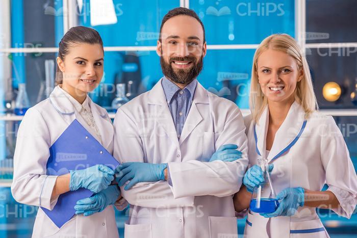 Research Team Wearing White Lab Coats Stock Photo