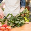 Gardener's Hands Cut Flowers Stock Photo