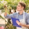 Young Man Working At Garden Stock Photo