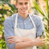 Smiling Gardener Holding Scissors Stock Photo
