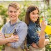Gardeners Stand Back To Back Stock Photo