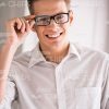 Smiling Young Man In White Classic Shirt Stock Photo