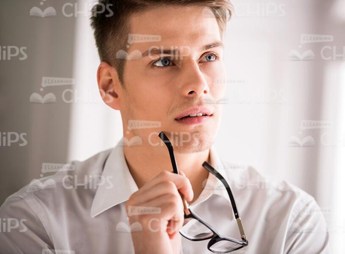 Close Up Pensive Young Man Stock Photo