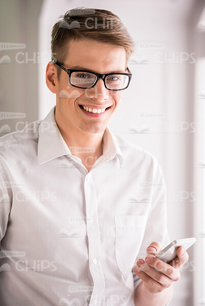Man Holding Smartphone Stock Photo