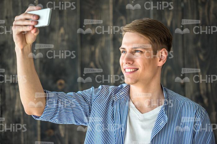 Close Up Stock Photo Of Young Guy Making Selfie With His Smartphone