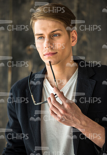 Thoughful Guy Looks Into The Distance Stock Photo